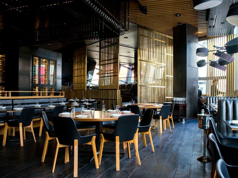 The dining room of a restaurant set before service