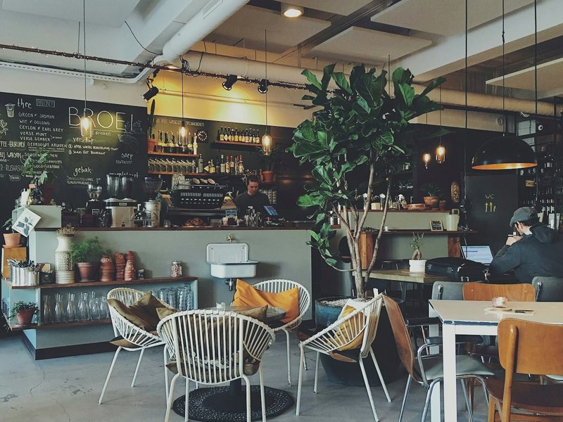 The interior of a busy independent cafe during service