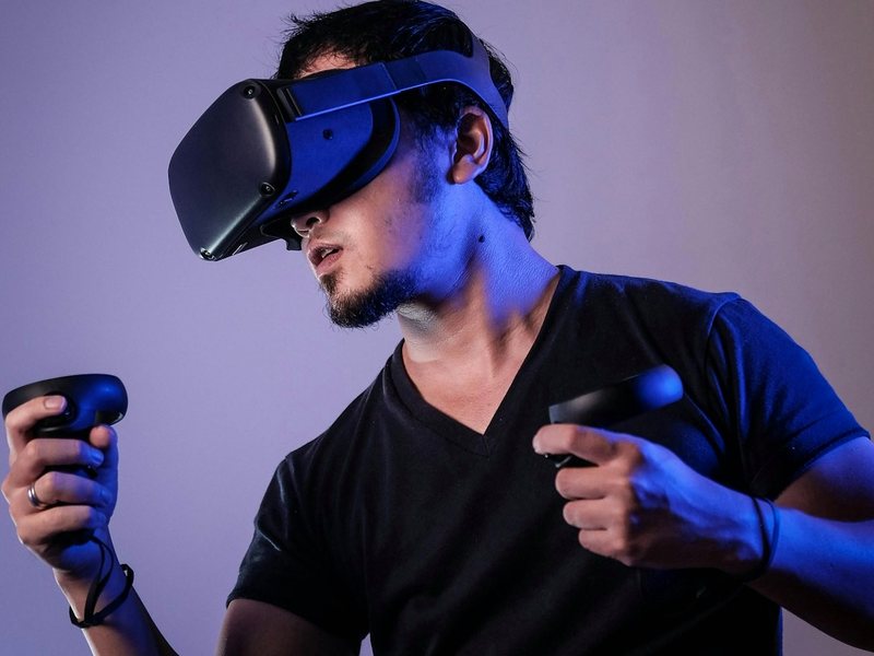 A person wearing a headset exploring an immersive three-dimensional space